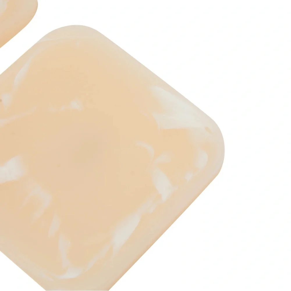 Ri-ri-ku resin coaster set. Brand new in box. 4 piece set.